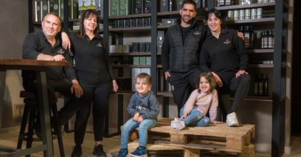 The Savouidakis Olive Oils family standing inside their production area