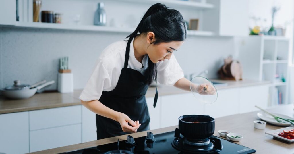 Woman cooking with Olive oil in Japan and South Korea
